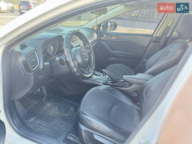 Белый Мазда 3, объемом двигателя 2 л и пробегом 94 тыс. км за 13000 $, фото 1 на Automoto.ua