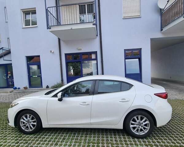 Белый Мазда 3, объемом двигателя 1.5 л и пробегом 98 тыс. км за 14029 $, фото 1 на Automoto.ua