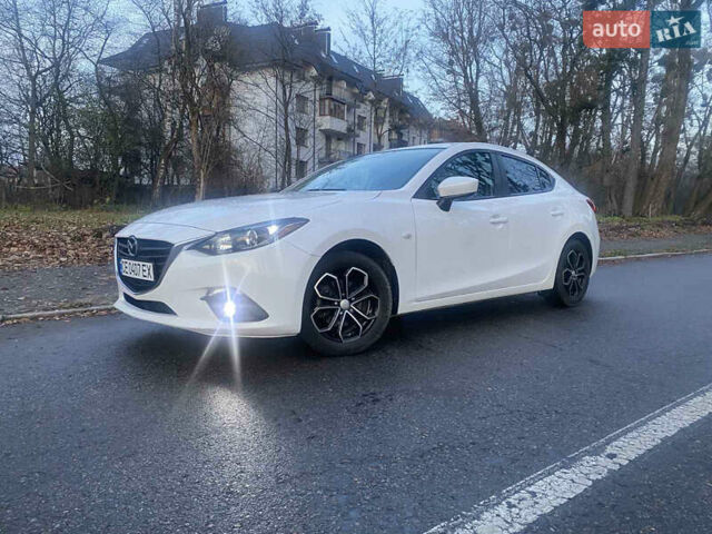 Белый Мазда 3, объемом двигателя 2 л и пробегом 120 тыс. км за 12500 $, фото 1 на Automoto.ua
