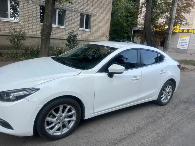 Білий Мазда 3, об'ємом двигуна 2 л та пробігом 80 тис. км за 11993 $, фото 1 на Automoto.ua