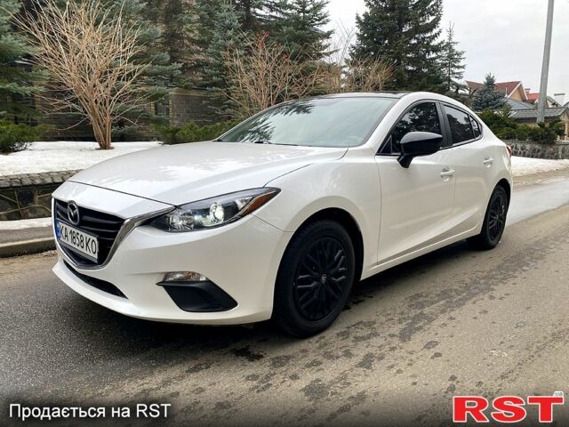 Белый Мазда 3, объемом двигателя 2 л и пробегом 60 тыс. км за 13000 $, фото 1 на Automoto.ua