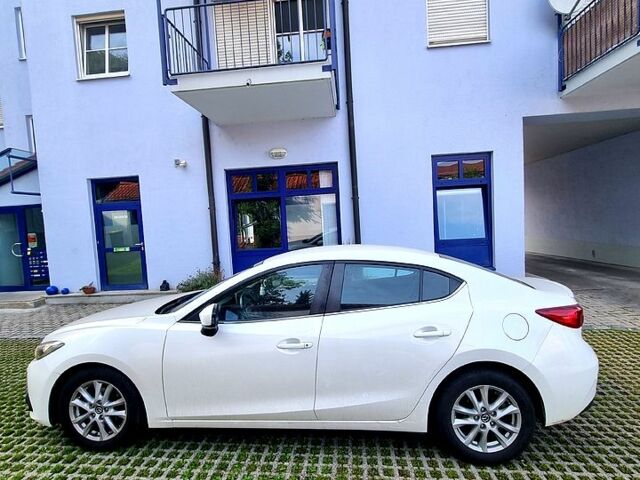 Білий Мазда 3, об'ємом двигуна 1.5 л та пробігом 98 тис. км за 13980 $, фото 1 на Automoto.ua