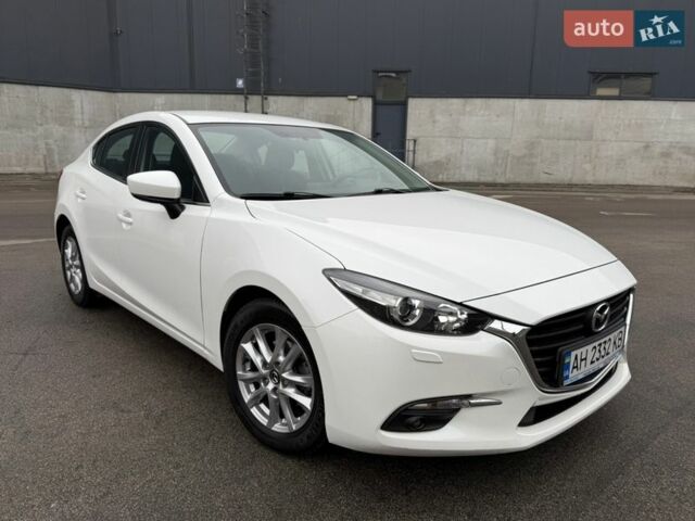 Білий Мазда 3, об'ємом двигуна 1.5 л та пробігом 58 тис. км за 15299 $, фото 1 на Automoto.ua
