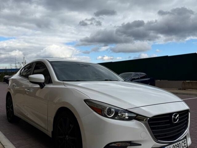 Белый Мазда 3, объемом двигателя 2 л и пробегом 196 тыс. км за 11000 $, фото 1 на Automoto.ua