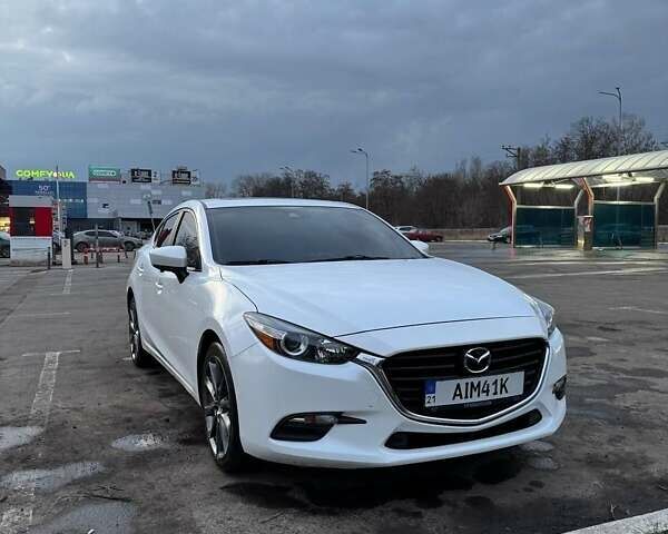 Білий Мазда 3, об'ємом двигуна 2.49 л та пробігом 108 тис. км за 12800 $, фото 1 на Automoto.ua