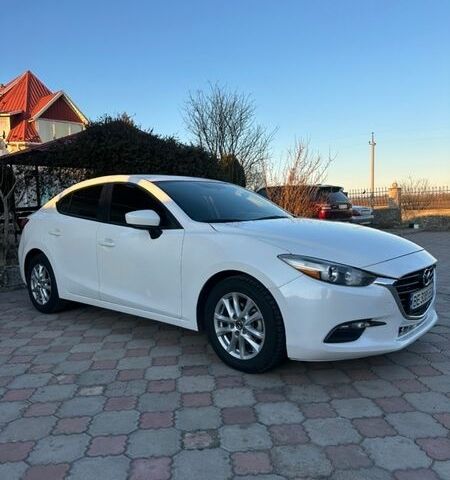 Белый Мазда 3, объемом двигателя 2 л и пробегом 107 тыс. км за 8800 $, фото 1 на Automoto.ua