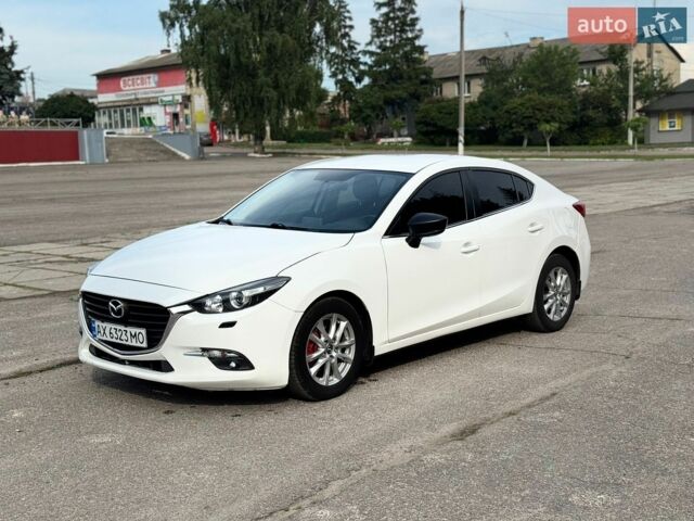 Білий Мазда 3, об'ємом двигуна 1.5 л та пробігом 103 тис. км за 9000 $, фото 1 на Automoto.ua
