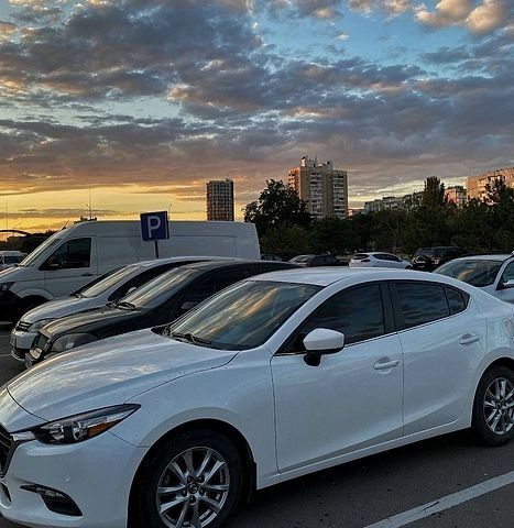 Білий Мазда 3, об'ємом двигуна 2 л та пробігом 170 тис. км за 12000 $, фото 1 на Automoto.ua