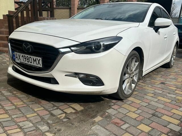 Белый Мазда 3, объемом двигателя 2.49 л и пробегом 125 тыс. км за 13900 $, фото 1 на Automoto.ua