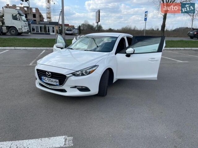 Белый Мазда 3, объемом двигателя 2 л и пробегом 110 тыс. км за 10500 $, фото 1 на Automoto.ua