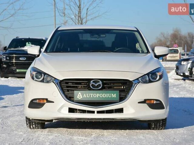 Білий Мазда 3, об'ємом двигуна 2 л та пробігом 90 тис. км за 12700 $, фото 1 на Automoto.ua
