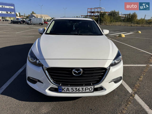 Белый Мазда 3, объемом двигателя 2 л и пробегом 96 тыс. км за 14000 $, фото 1 на Automoto.ua