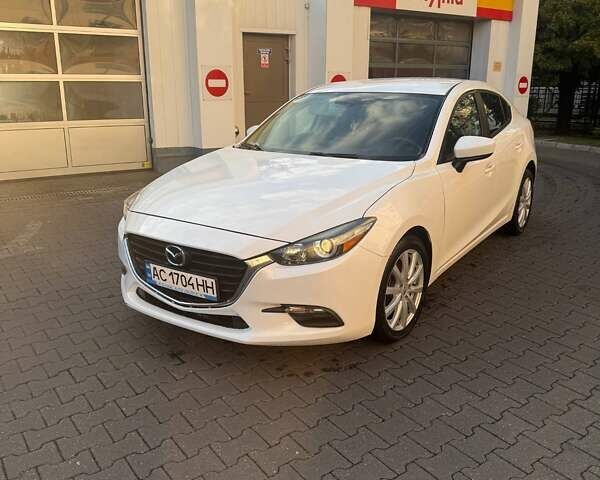 Белый Мазда 3, объемом двигателя 2 л и пробегом 109 тыс. км за 11800 $, фото 1 на Automoto.ua
