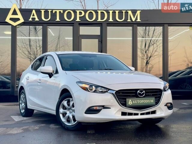 Белый Мазда 3, объемом двигателя 2 л и пробегом 90 тыс. км за 12500 $, фото 1 на Automoto.ua