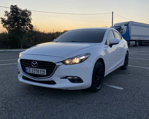Белый Мазда 3, объемом двигателя 2 л и пробегом 116 тыс. км за 12950 $, фото 1 на Automoto.ua