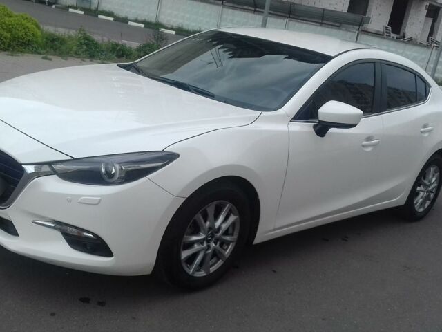 Білий Мазда 3, об'ємом двигуна 1.5 л та пробігом 15 тис. км за 21000 $, фото 1 на Automoto.ua