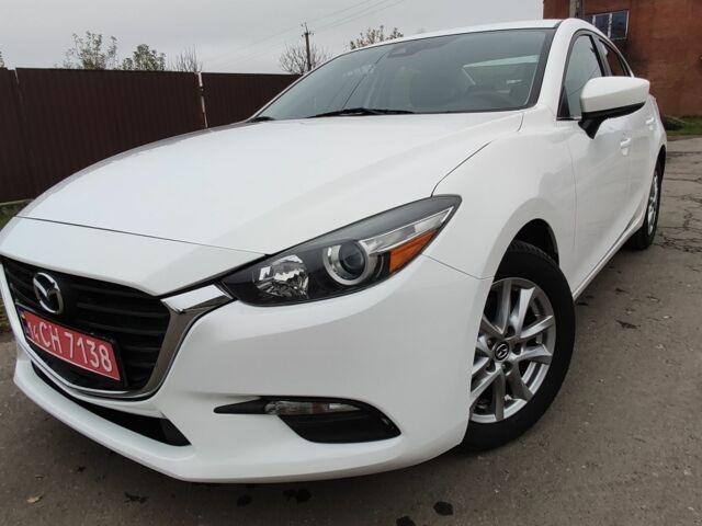 Белый Мазда 3, объемом двигателя 2 л и пробегом 202 тыс. км за 11800 $, фото 1 на Automoto.ua