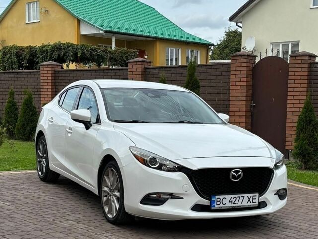Белый Мазда 3, объемом двигателя 2.49 л и пробегом 127 тыс. км за 13799 $, фото 1 на Automoto.ua
