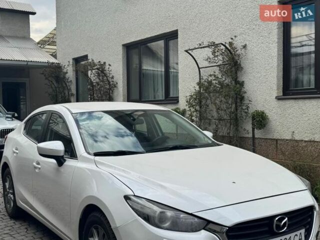 Белый Мазда 3, объемом двигателя 1.5 л и пробегом 170 тыс. км за 13500 $, фото 1 на Automoto.ua