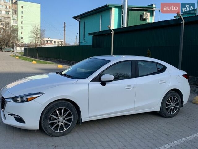 Белый Мазда 3, объемом двигателя 2 л и пробегом 82 тыс. км за 11800 $, фото 1 на Automoto.ua