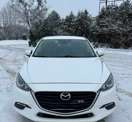 Белый Мазда 3, объемом двигателя 2 л и пробегом 130 тыс. км за 9330 $, фото 1 на Automoto.ua