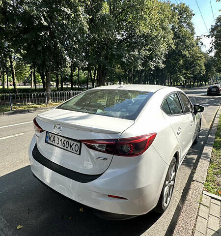 Белый Мазда 3, объемом двигателя 2 л и пробегом 99 тыс. км за 13950 $, фото 1 на Automoto.ua
