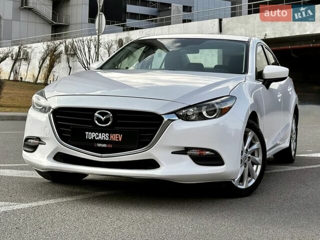 Белый Мазда 3, объемом двигателя 2 л и пробегом 95 тыс. км за 11800 $, фото 1 на Automoto.ua