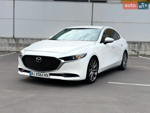 Белый Мазда 3, объемом двигателя 2.49 л и пробегом 99 тыс. км за 13500 $, фото 1 на Automoto.ua