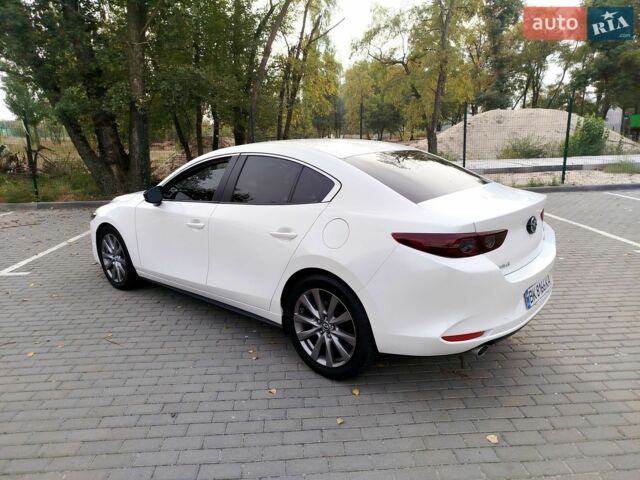 Белый Мазда 3, объемом двигателя 2.5 л и пробегом 180 тыс. км за 12500 $, фото 1 на Automoto.ua
