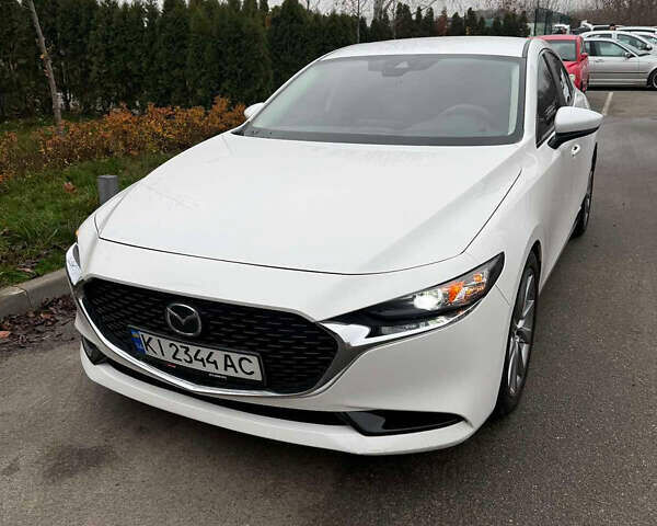 Белый Мазда 3, объемом двигателя 2.49 л и пробегом 95 тыс. км за 16399 $, фото 1 на Automoto.ua