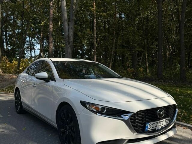 Білий Мазда 3, об'ємом двигуна 2.49 л та пробігом 57 тис. км за 17500 $, фото 1 на Automoto.ua
