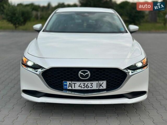 Белый Мазда 3, объемом двигателя 2.49 л и пробегом 114 тыс. км за 13800 $, фото 1 на Automoto.ua