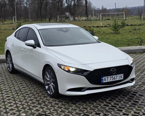 Белый Мазда 3, объемом двигателя 2.49 л и пробегом 140 тыс. км за 14950 $, фото 1 на Automoto.ua