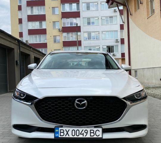 Белый Мазда 3, объемом двигателя 2.49 л и пробегом 109 тыс. км за 15100 $, фото 1 на Automoto.ua