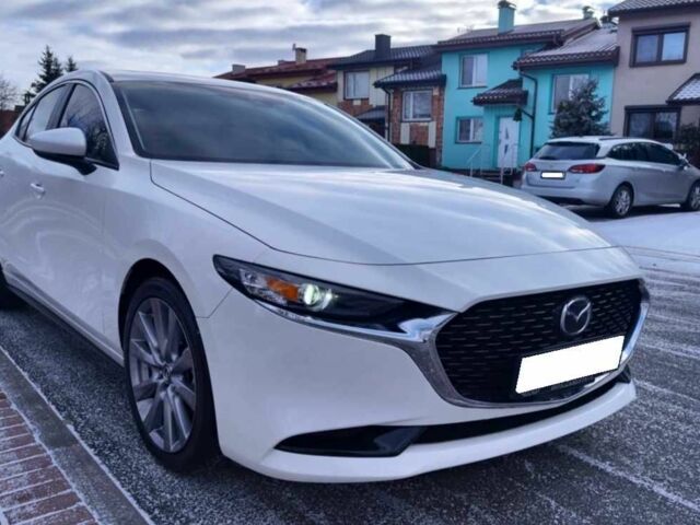 Білий Мазда 3, об'ємом двигуна 2 л та пробігом 21 тис. км за 14800 $, фото 1 на Automoto.ua