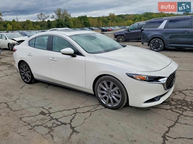 Білий Мазда 3, об'ємом двигуна 2.49 л та пробігом 25 тис. км за 3400 $, фото 1 на Automoto.ua