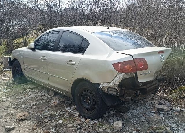 Бежевый Мазда 3, объемом двигателя 0 л и пробегом 150 тыс. км за 1899 $, фото 1 на Automoto.ua