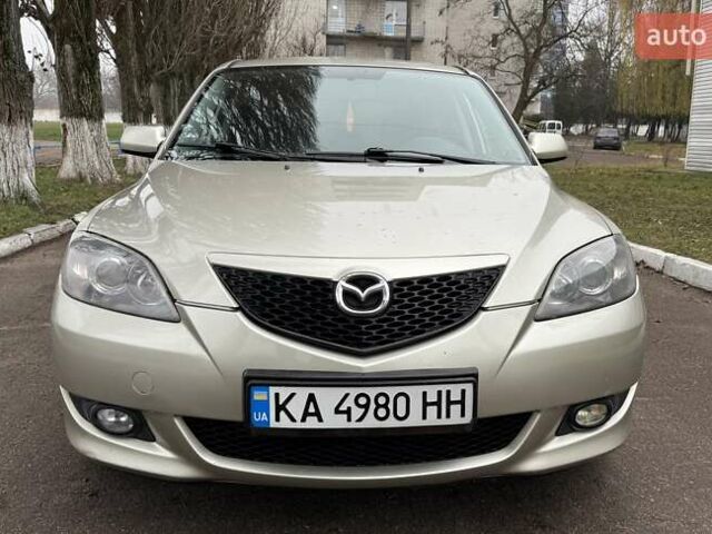 Бежевый Мазда 3, объемом двигателя 1.6 л и пробегом 262 тыс. км за 4250 $, фото 1 на Automoto.ua