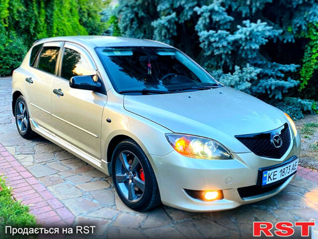 Бежевый Мазда 3, объемом двигателя 1.6 л и пробегом 180 тыс. км за 4750 $, фото 1 на Automoto.ua