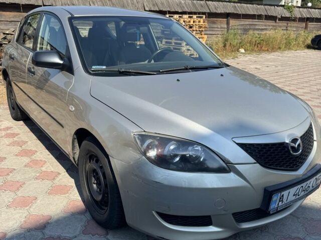 Бежевый Мазда 3, объемом двигателя 1.3 л и пробегом 221 тыс. км за 2900 $, фото 1 на Automoto.ua