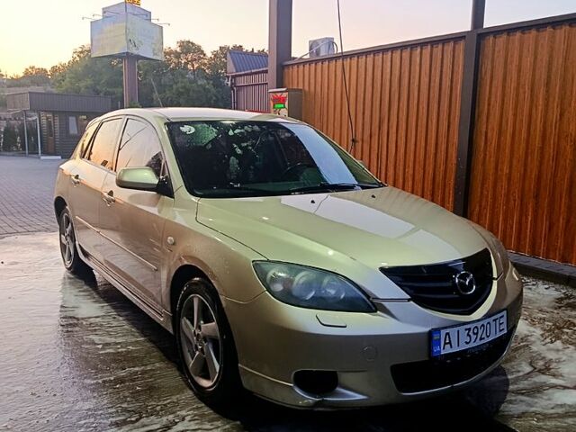 Бежевий Мазда 3, об'ємом двигуна 1.6 л та пробігом 130 тис. км за 4000 $, фото 1 на Automoto.ua