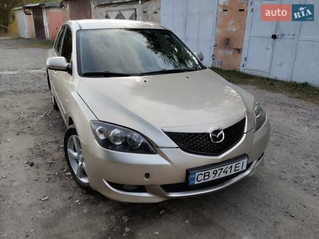 Бежевий Мазда 3, об'ємом двигуна 1.6 л та пробігом 250 тис. км за 4550 $, фото 1 на Automoto.ua