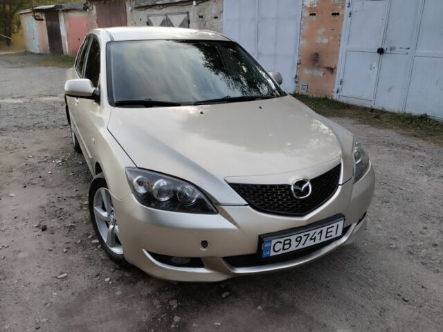 Бежевый Мазда 3, объемом двигателя 1.6 л и пробегом 250 тыс. км за 4550 $, фото 1 на Automoto.ua