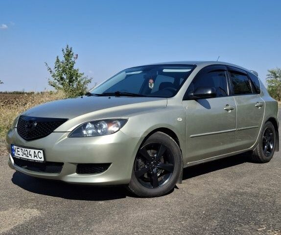 Бежевий Мазда 3, об'ємом двигуна 1.6 л та пробігом 284 тис. км за 4298 $, фото 1 на Automoto.ua