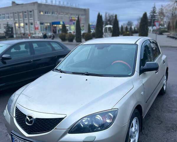 Бежевый Мазда 3, объемом двигателя 1.6 л и пробегом 225 тыс. км за 1600 $, фото 1 на Automoto.ua