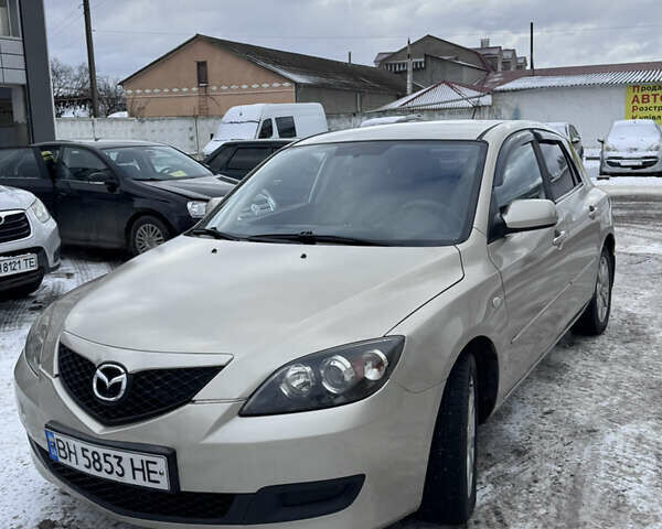 Бежевый Мазда 3, объемом двигателя 1.6 л и пробегом 230 тыс. км за 4950 $, фото 1 на Automoto.ua