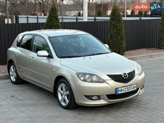 Бежевый Мазда 3, объемом двигателя 1.6 л и пробегом 170 тыс. км за 5000 $, фото 1 на Automoto.ua
