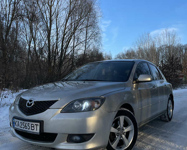 Бежевый Мазда 3, объемом двигателя 1.6 л и пробегом 170 тыс. км за 5200 $, фото 1 на Automoto.ua