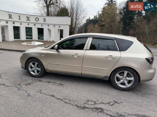 Бежевый Мазда 3, объемом двигателя 1.6 л и пробегом 158 тыс. км за 4500 $, фото 1 на Automoto.ua