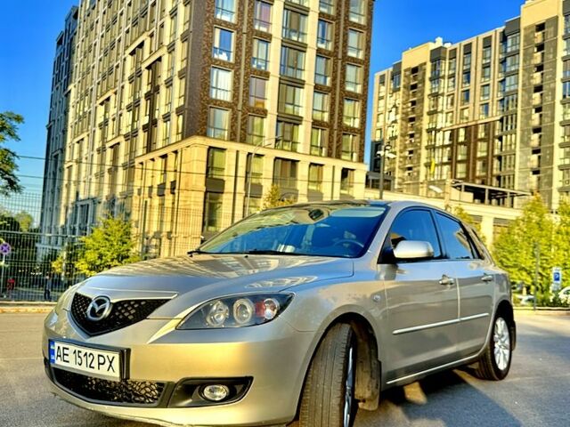 Бежевый Мазда 3, объемом двигателя 1.6 л и пробегом 192 тыс. км за 5800 $, фото 1 на Automoto.ua